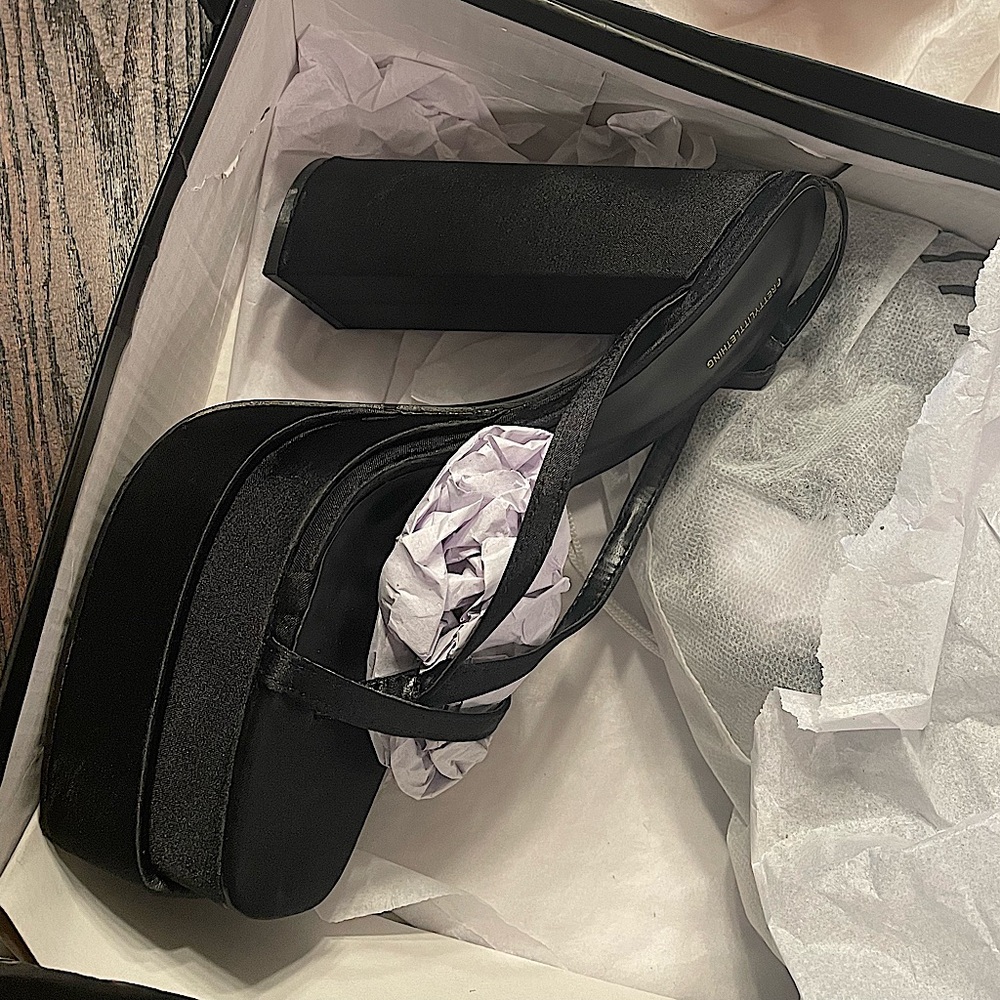 Brand new, never been worn. Original box with damaged to box due to shipping